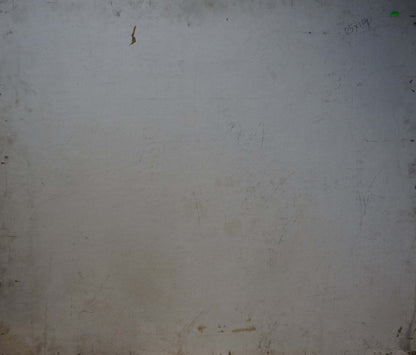 Back of oil painting On the shore with worn off-white wall and green sticker