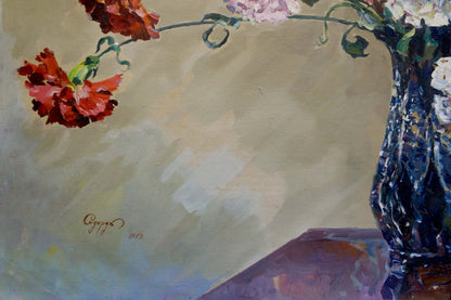 Oil painting of red pink carnations in dark blue textured vase by Sidoruk Vladimir Fedorovich