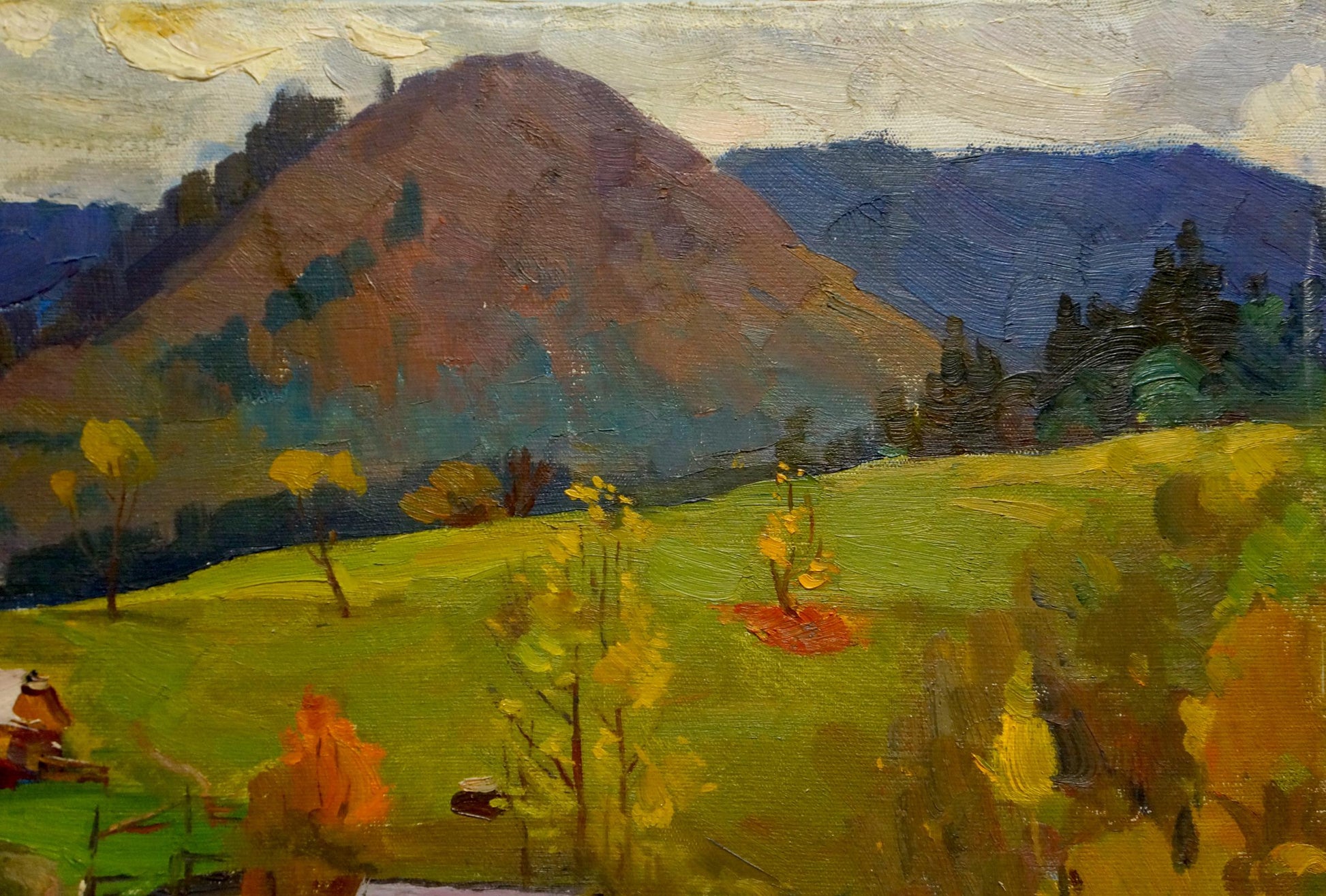 Oil painting by Shutev Ivan Mikhailovich: green hillside, autumn trees, mountains