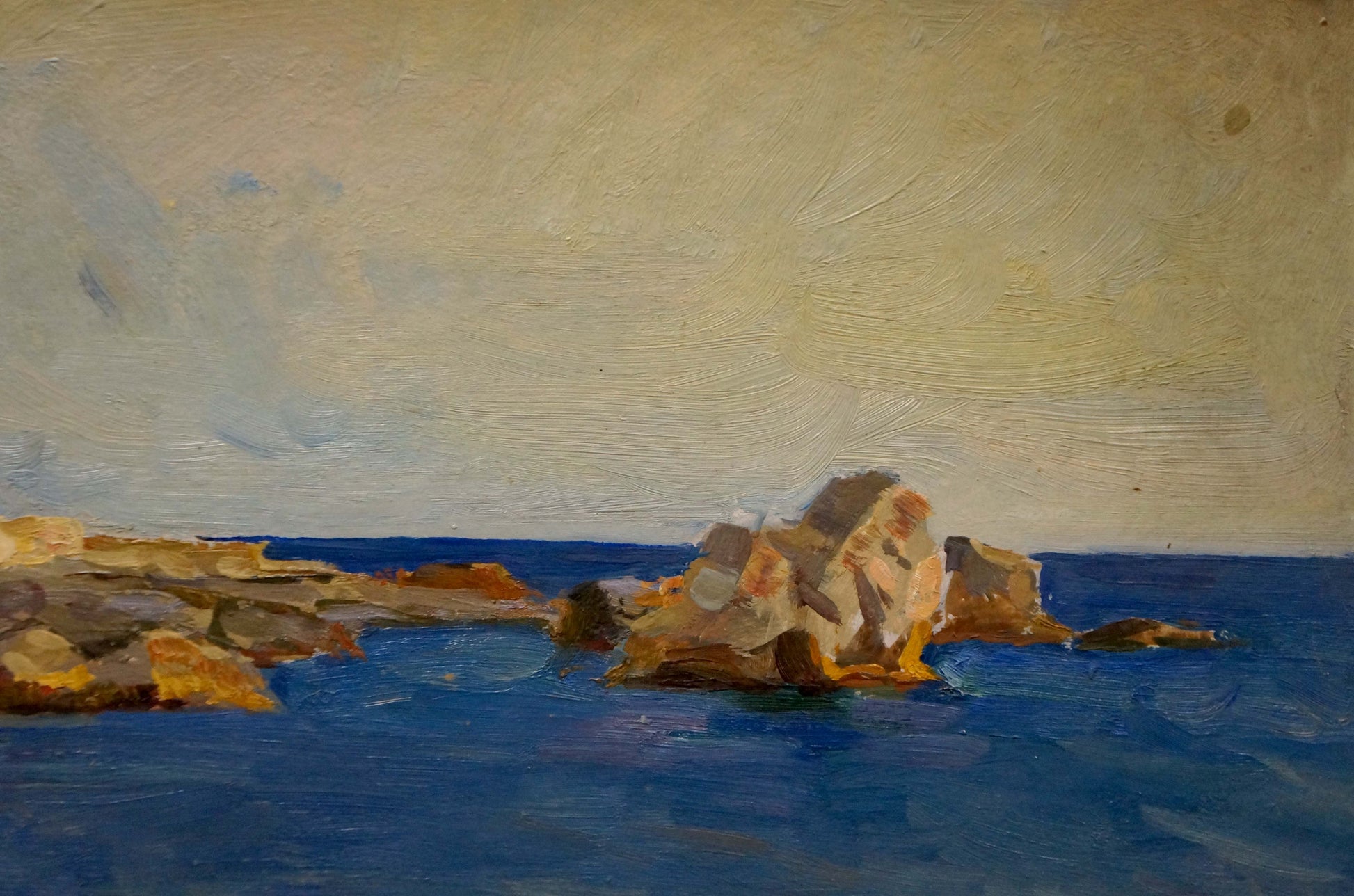 Oil painting of sunlit rocks in sea by Kobylenkov Mikhail Vasilievich