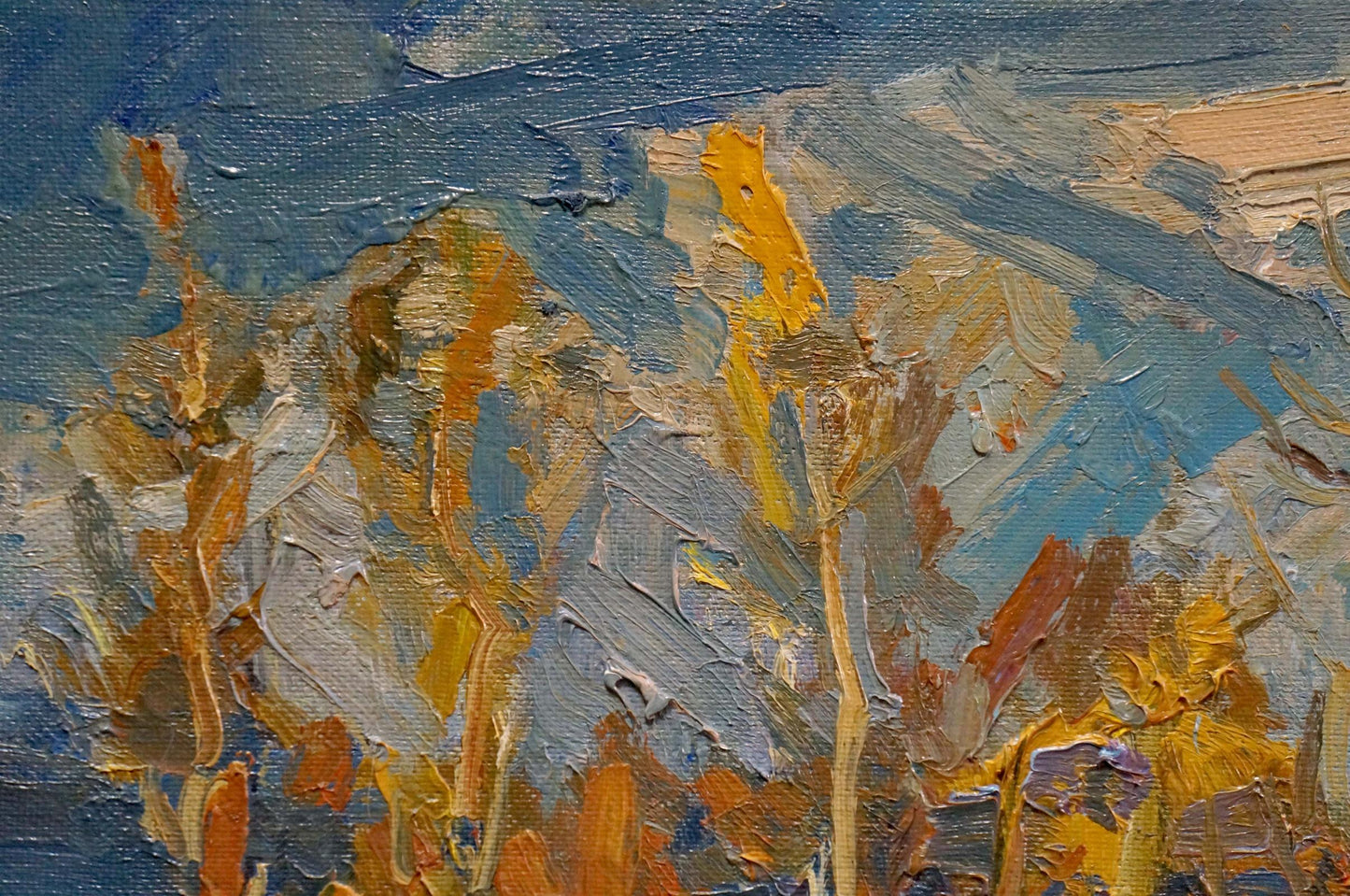 Oil painting of autumn deciduous forest with bold blue orange yellow strokes