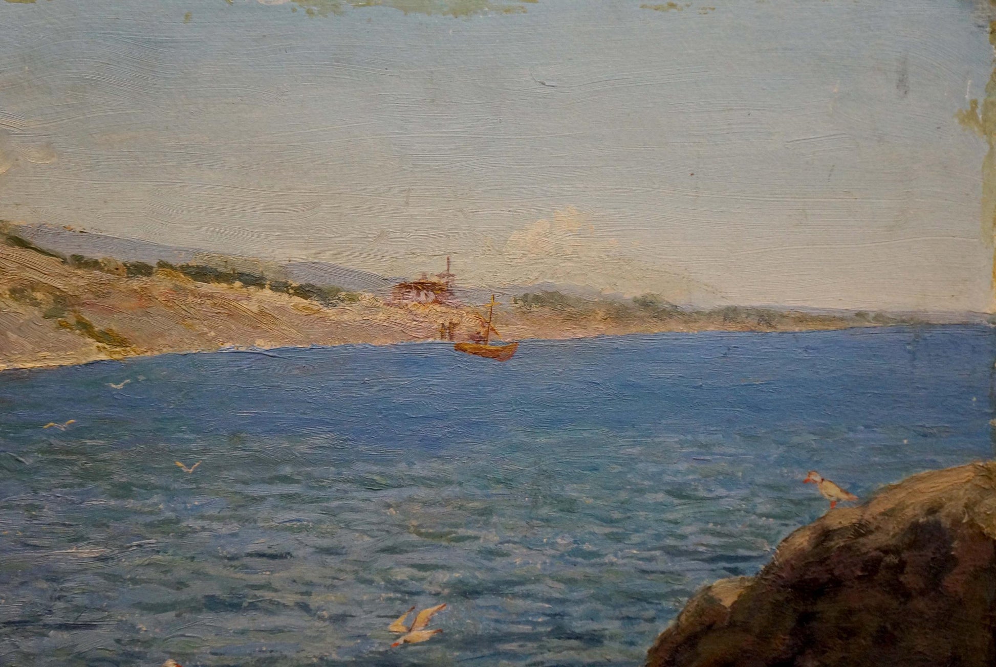 Serene coastal oil painting by Martynov Anatoly Vladimirovich with orange boat