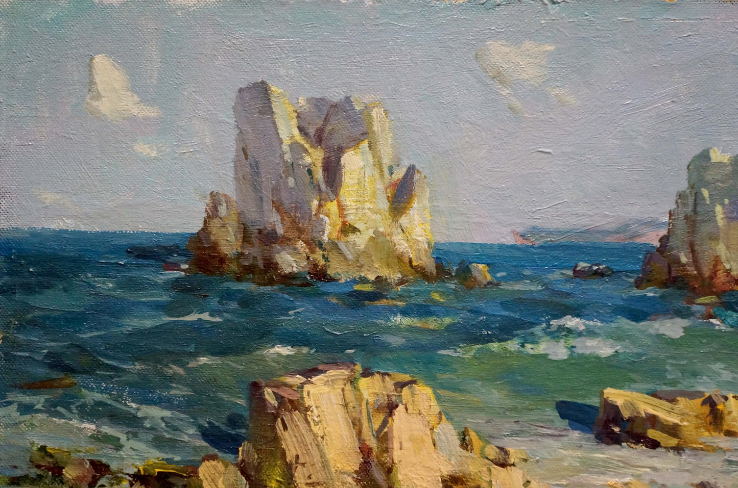 Oil painting By the Sea by Levichev H.V.: sunlit coastal rocks in turbulent waters