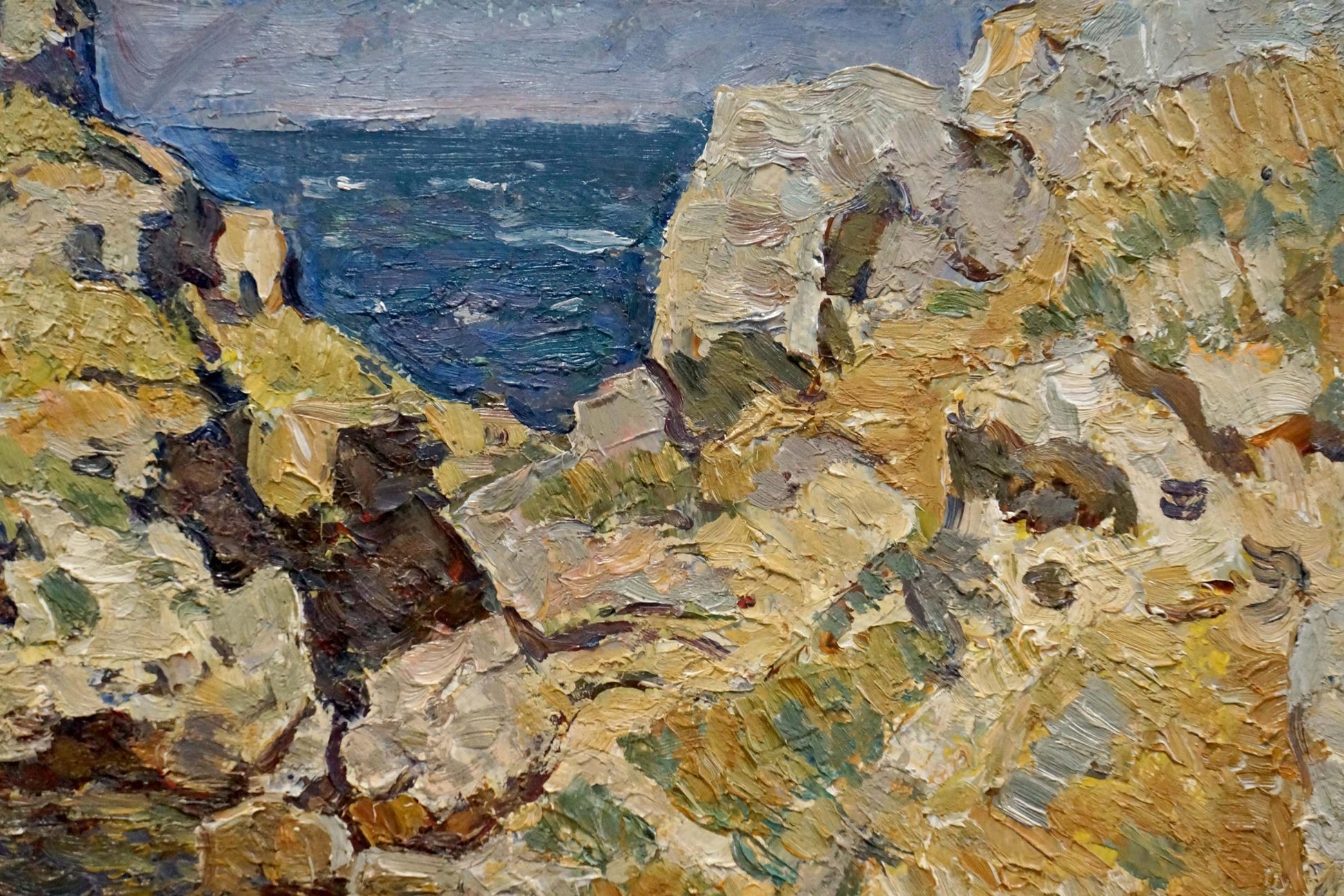 Textured oil painting of rugged coastal cliffs by Konovalov Yuri Alexandrovich