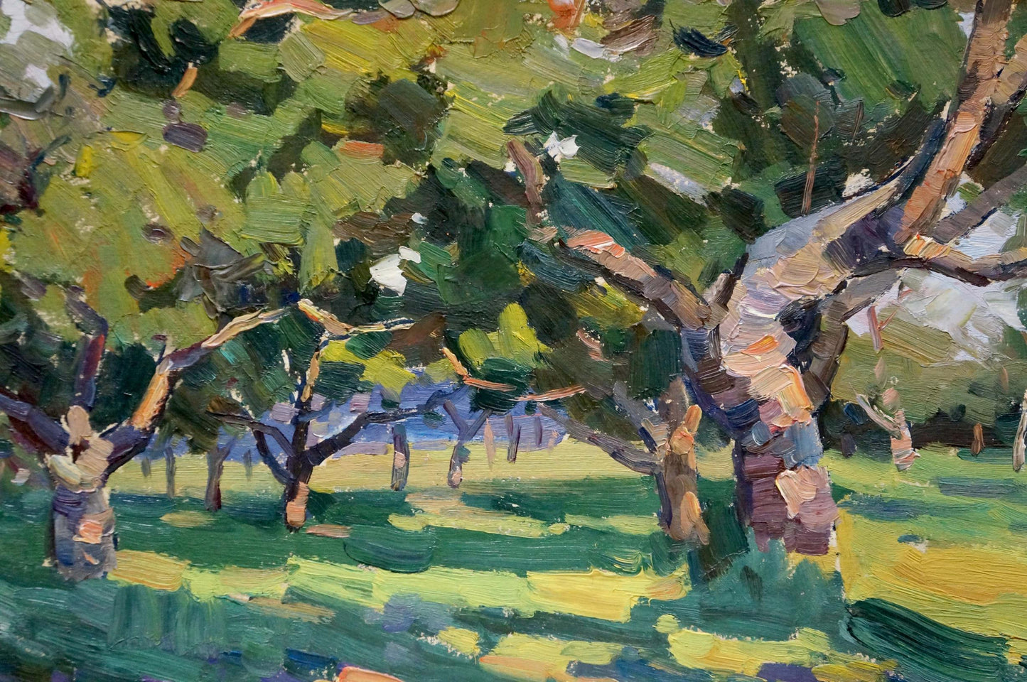 Vibrant impressionist oil painting by Martynov Nikolay Ustinovich of sunlit orchard