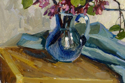 Oil painting by Crimson Ostanny Galina Afanasyevna: translucent blue glass pitcher with pink blossoms