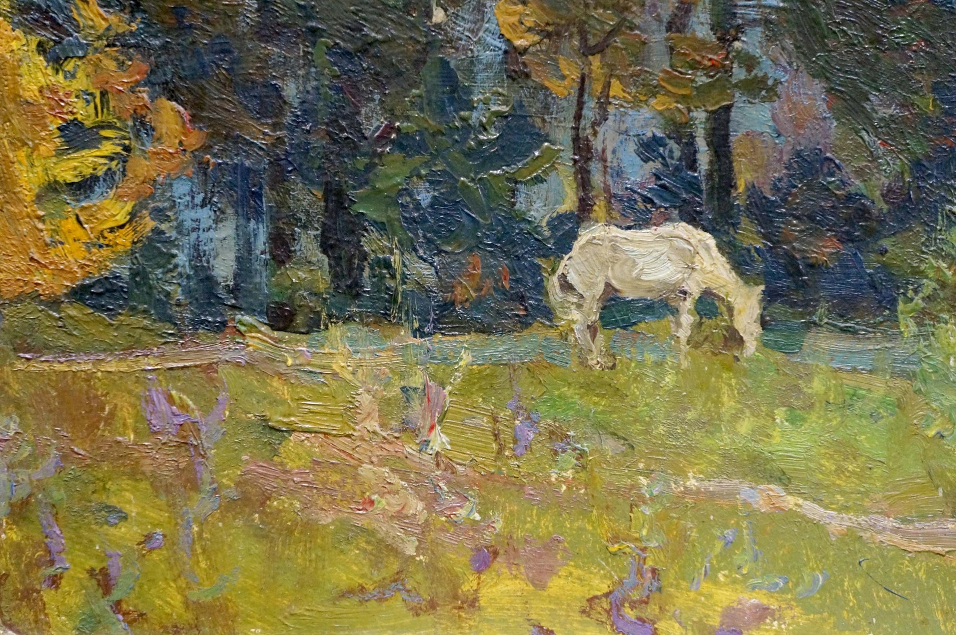Oil painting of white horse grazing in impressionistic yellow green field near forest by Zhabinsky Leonid Andreevich