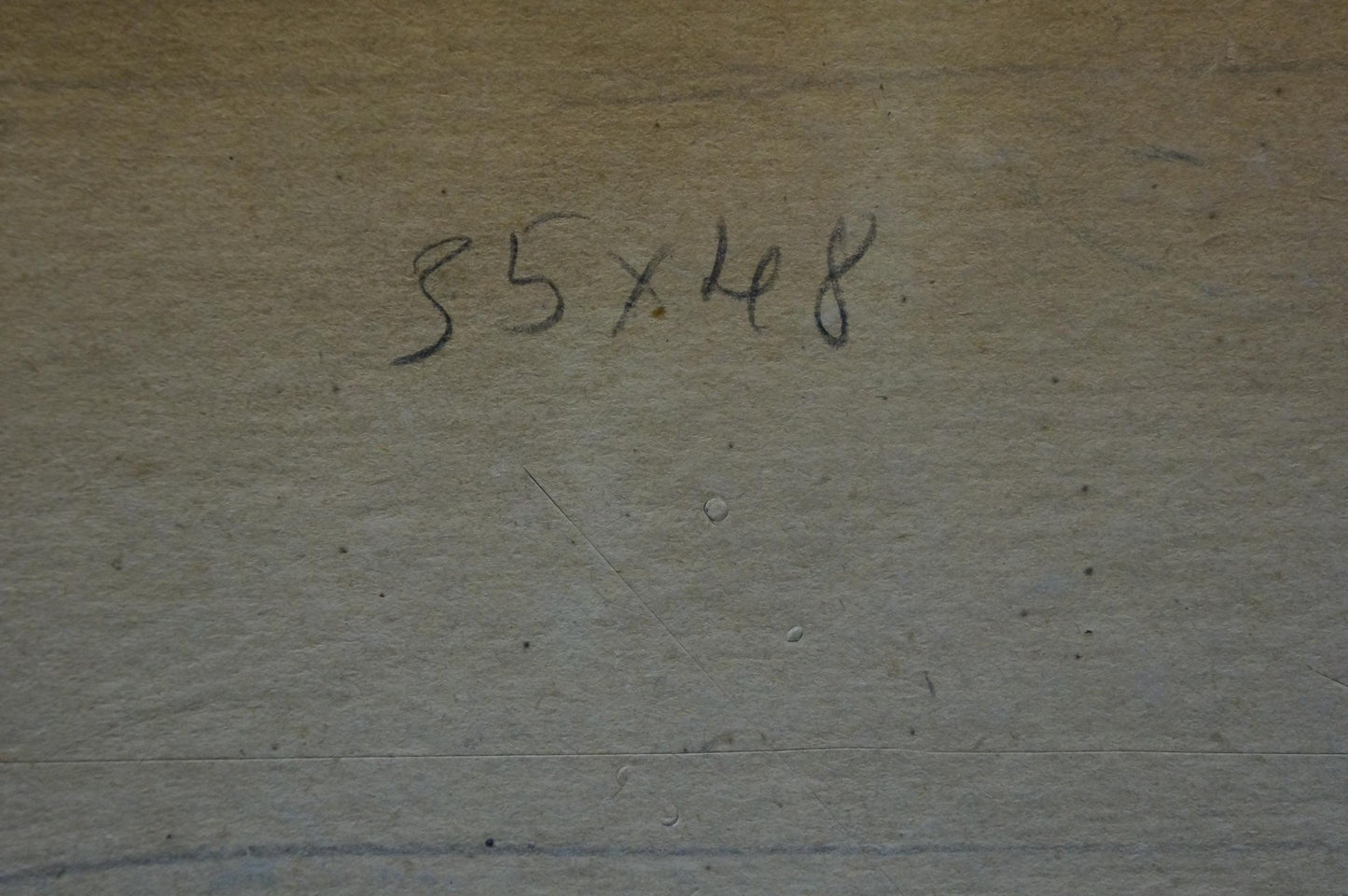 Back of oil painting Ships sail on the sea with 55x48 inch handwritten markings on beige surface