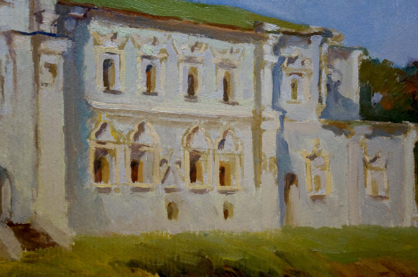 Oil painting museum: white stone castle with arched windows and green roof