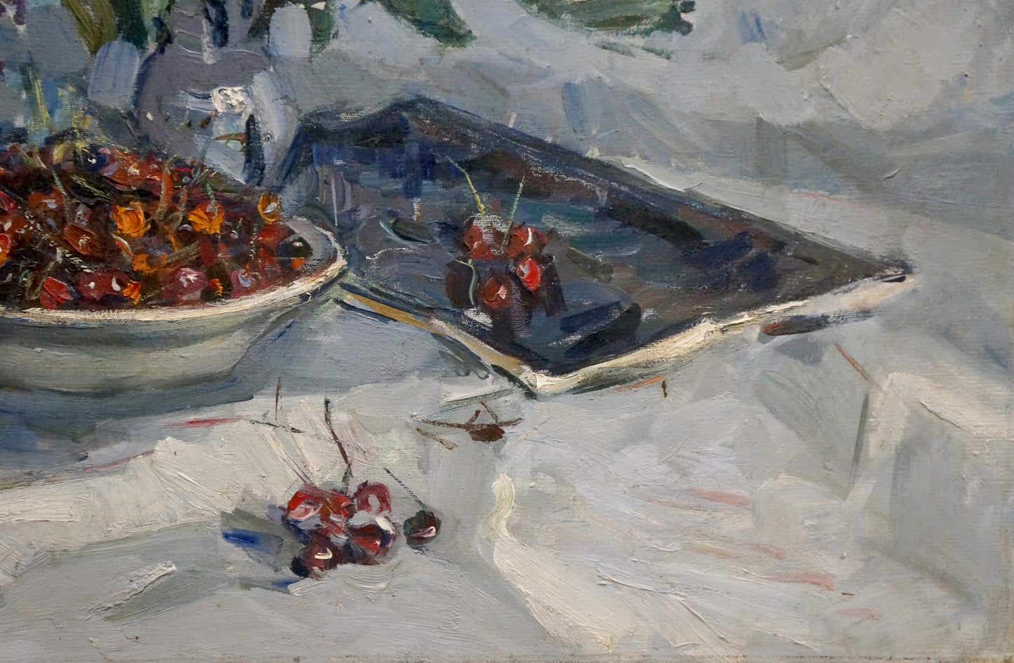 Oil painting of vibrant red cherries in white bowl by Vera Dovgalevskaya