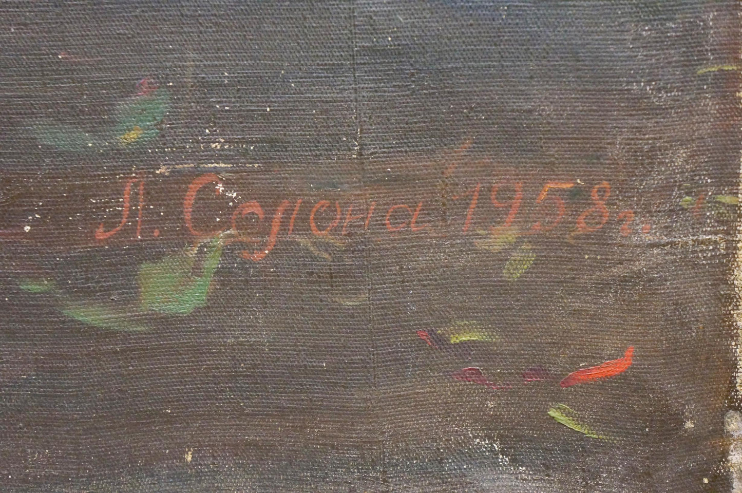 Back of Oil painting Flowers Solona L. R. with red cursive j. signature and date