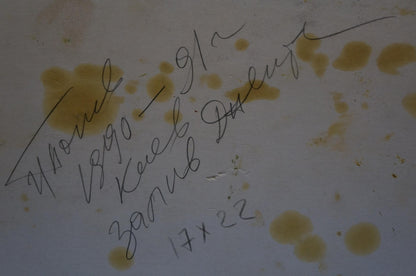 Back of Oil painting Haystacks by Popov Igor Alexandrovich with handwritten black ink inscription on faded stained surface