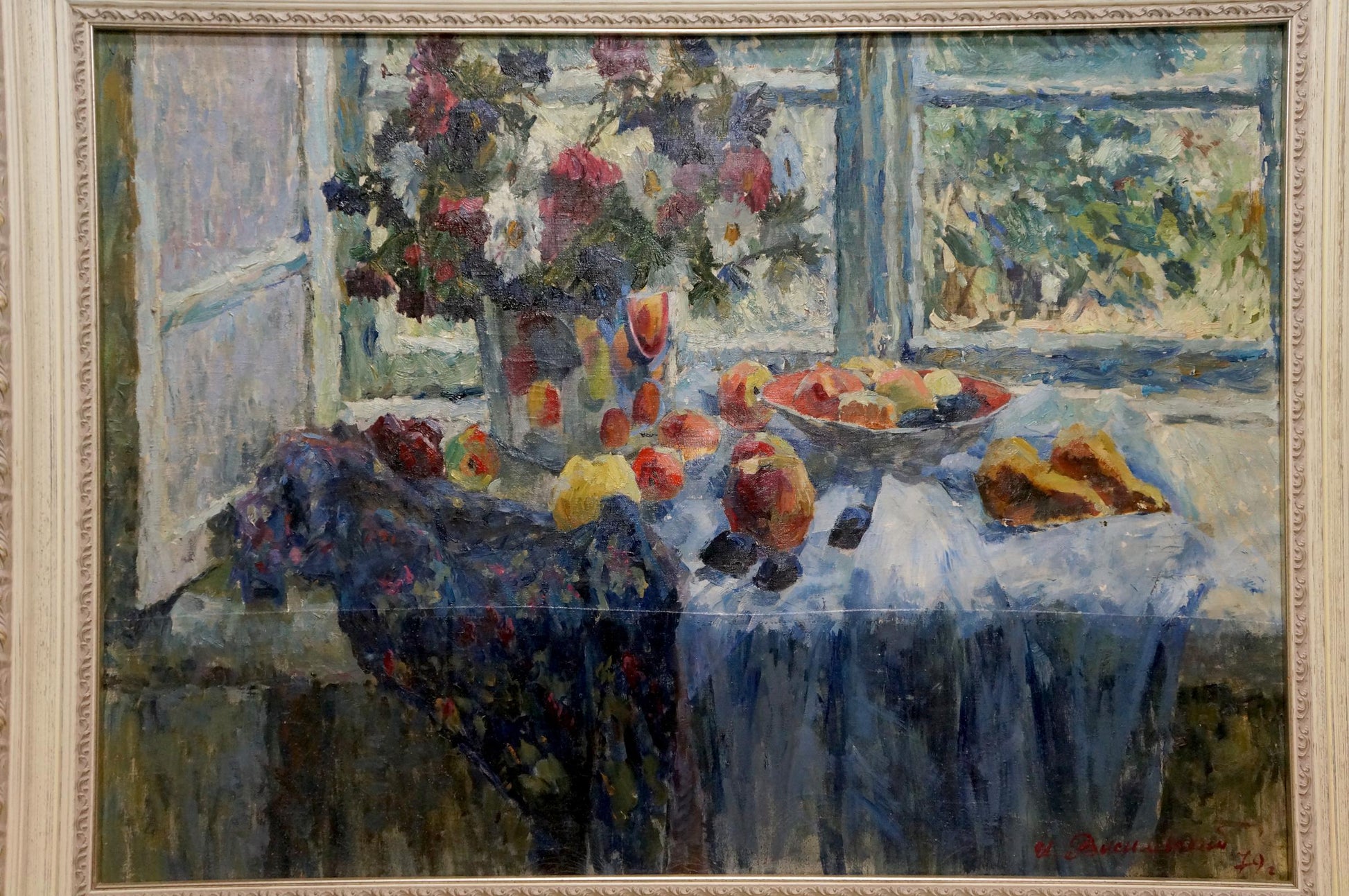 Oil painting by Vasilevsky Igor Eduardovich: still life with red yellow fruits, flowers, window view