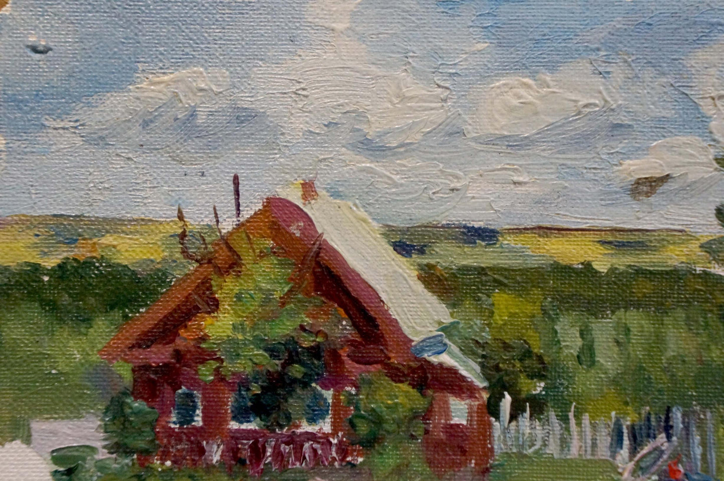 Oil painting of red wooden house with white roof in village landscape by Dmitry Lednev