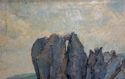 Oil painting of house by shore with rugged gray rocks and muted sky