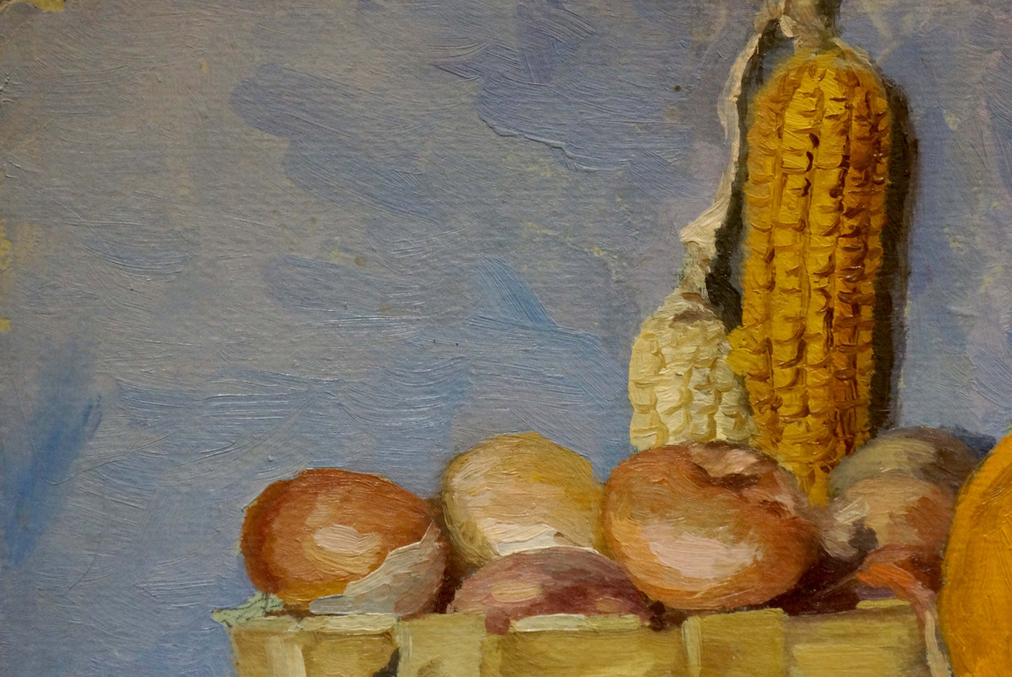 Vibrant yellow corn cob oil painting on textured blue background