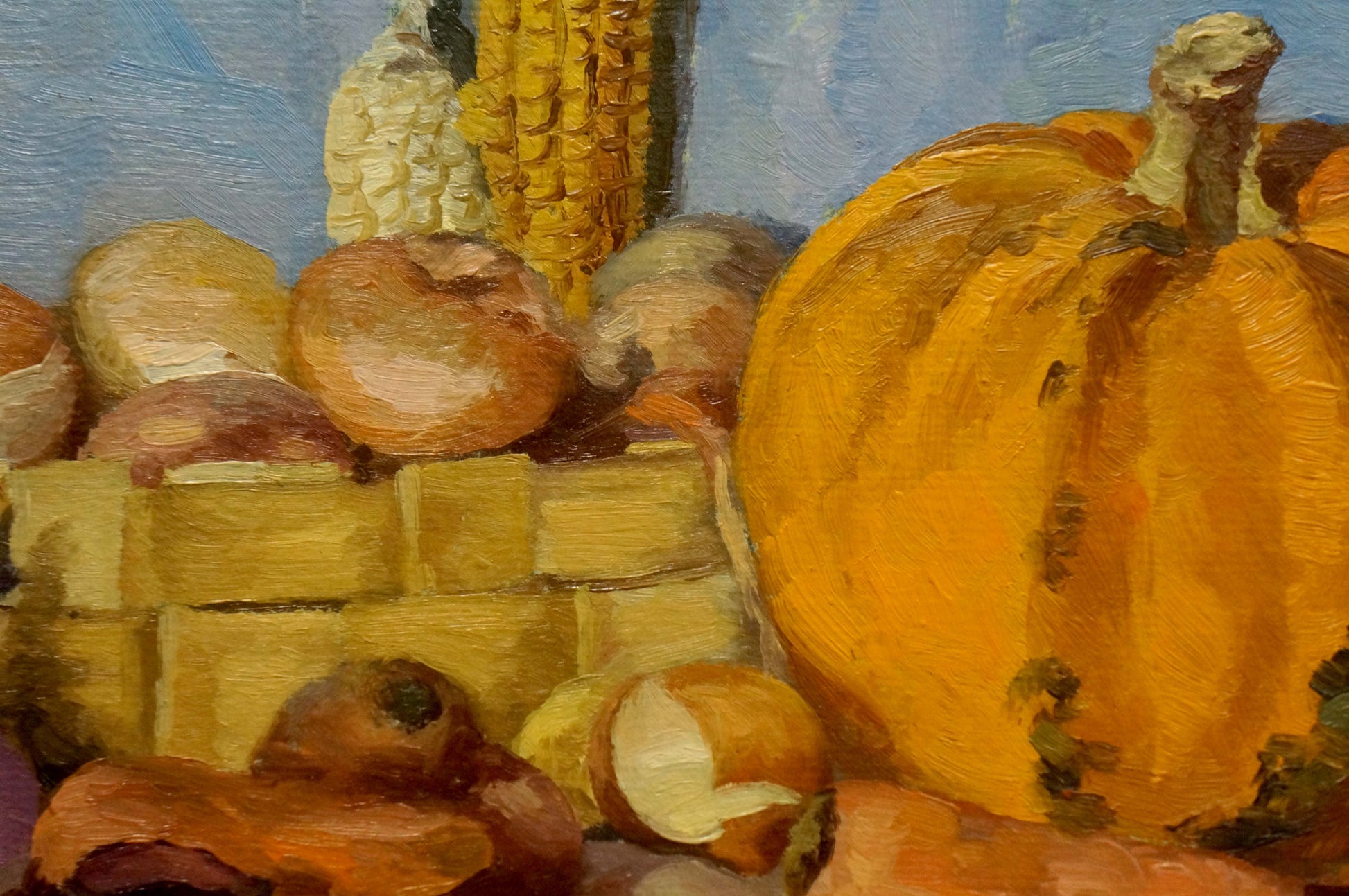 Oil painting of vibrant orange pumpkin with bumpy texture and green stem