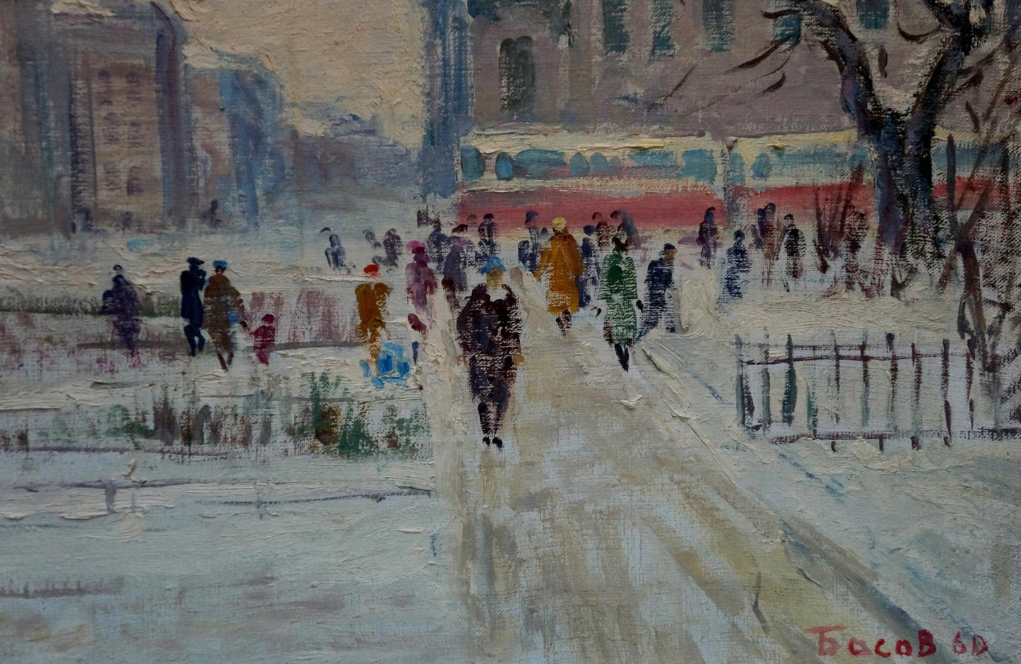 Impressionist oil painting of snowy city center by Yakov Basov with red bus