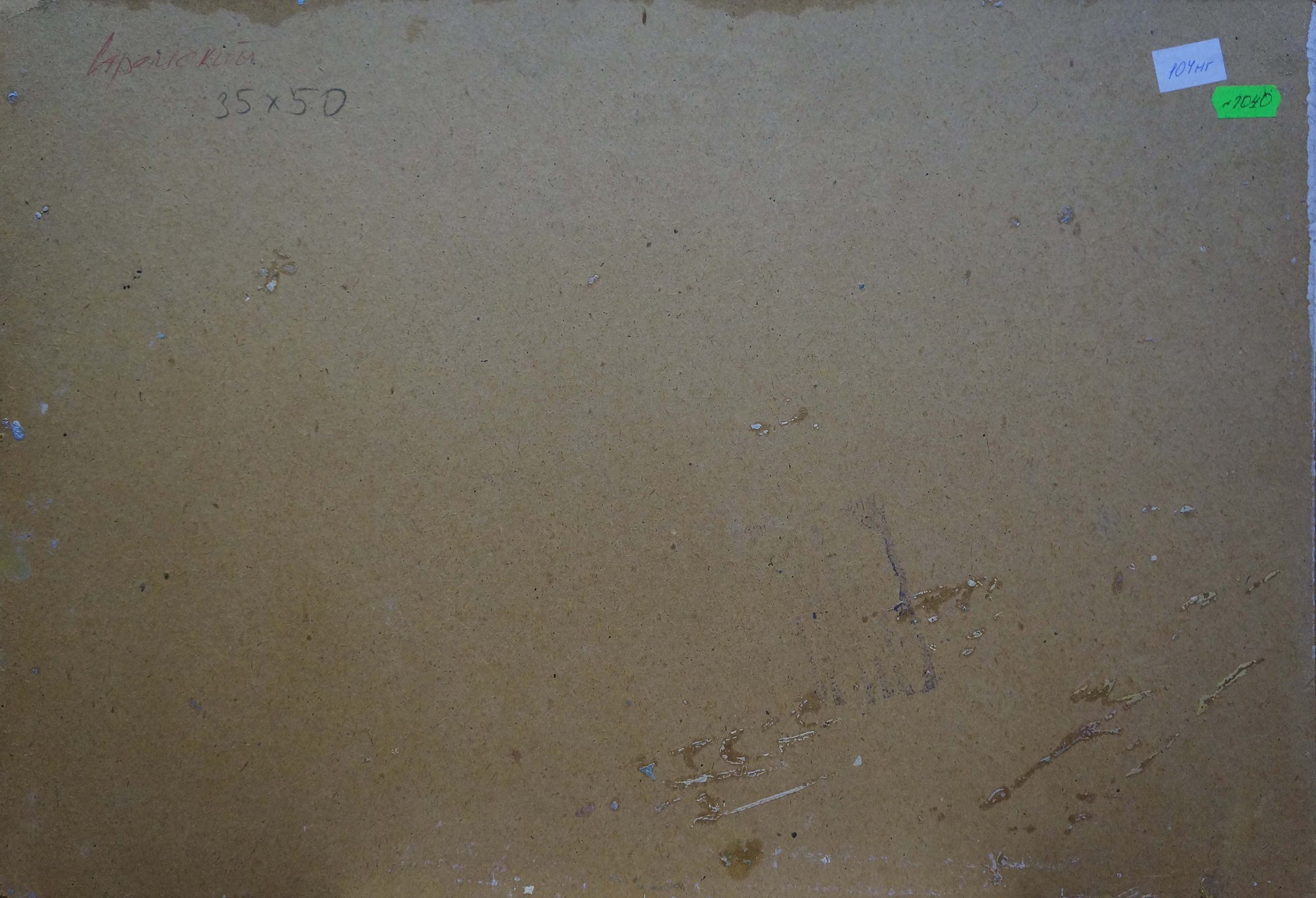 The back of a beige, textured canvas painting with handwritten dimensions and small adhesive labels in the corners.