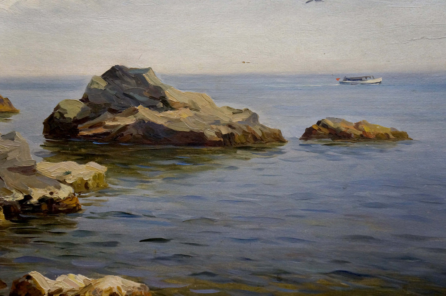 Serene oil painting by Stepan Yarovoy: yacht at sea horizon on sunlit rocks