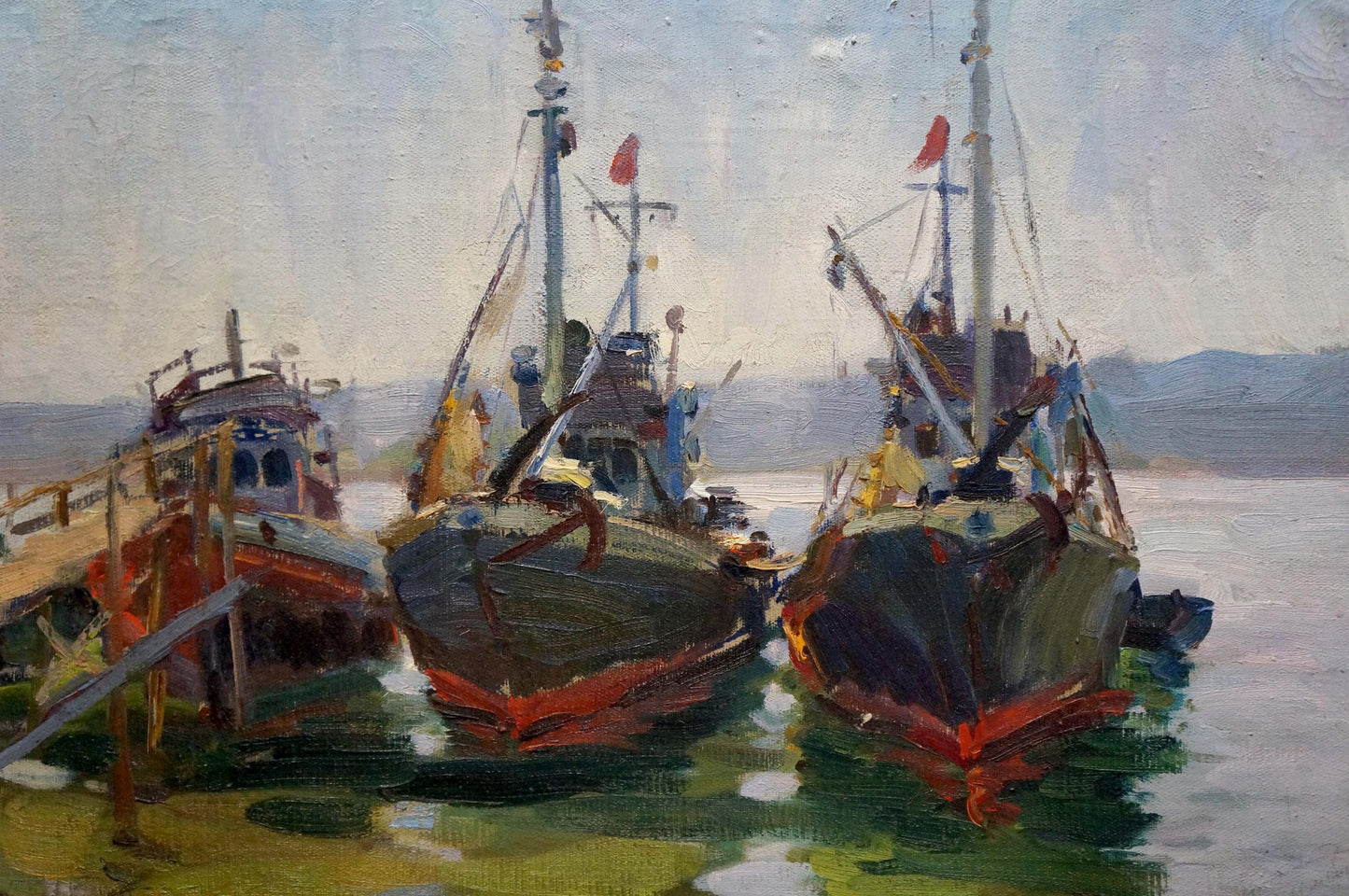 Oil painting by Kolomoitsev Petr Mikhailovich: three red-hulled boats in harbor