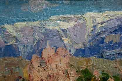 Oil painting of rugged blue-purple cliffs and terracotta rocks by Arkady Strelov
