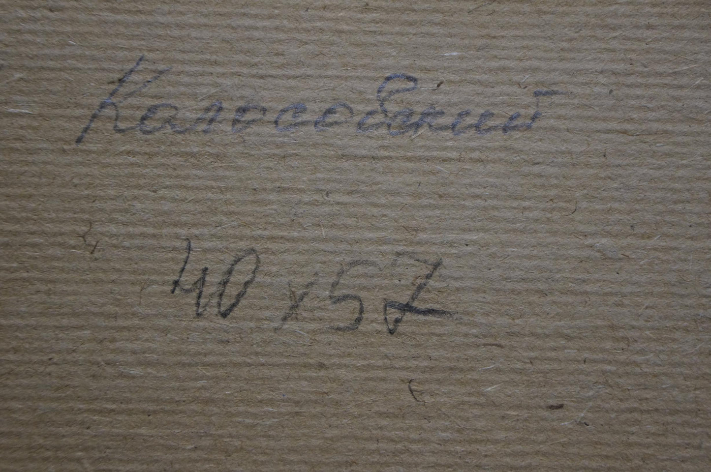 Back of Georgy Kolosovsky oil painting with handwritten signature on beige paper