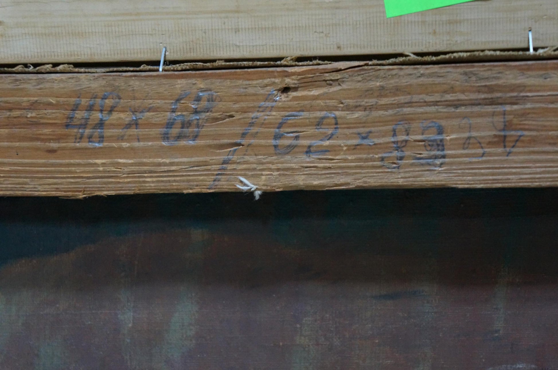 Back of Oil painting Road to the park Kisel Ivan Gordeevich: weathered wooden beam with faded blue markings
