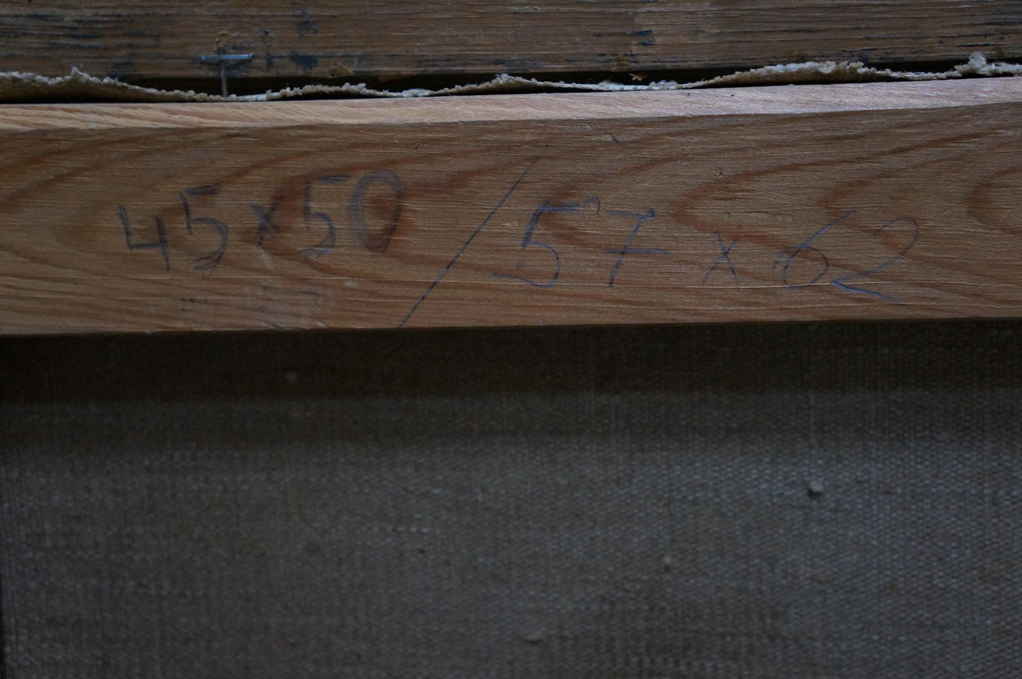 Back of oil painting by Dmitry Georgievich Salov: light brown wooden beam with handwritten measurements