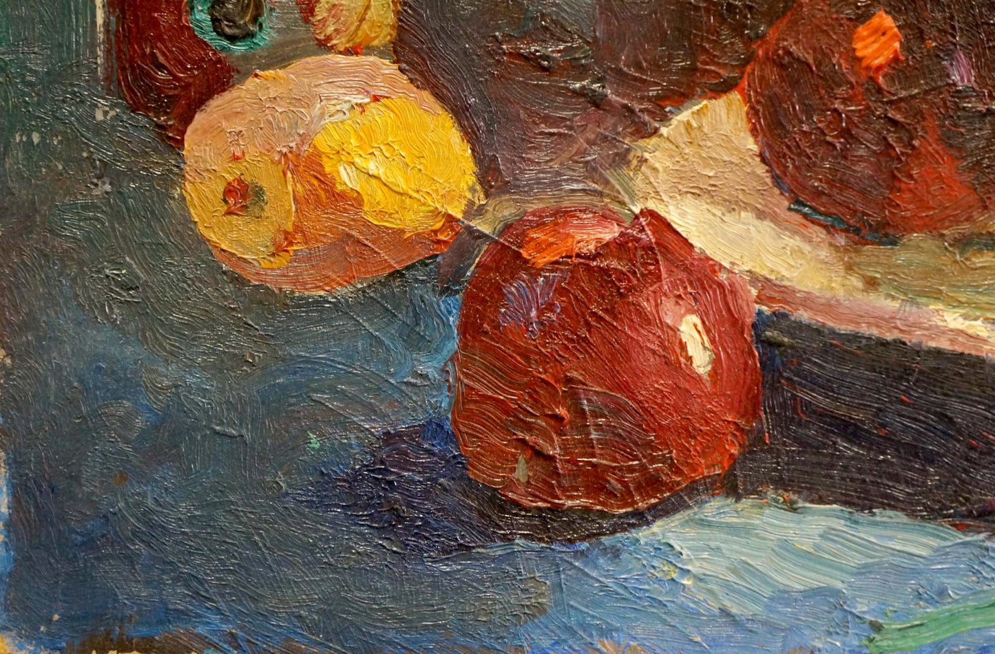 Oil painting of vibrant red apple on table by Sergeev N. S