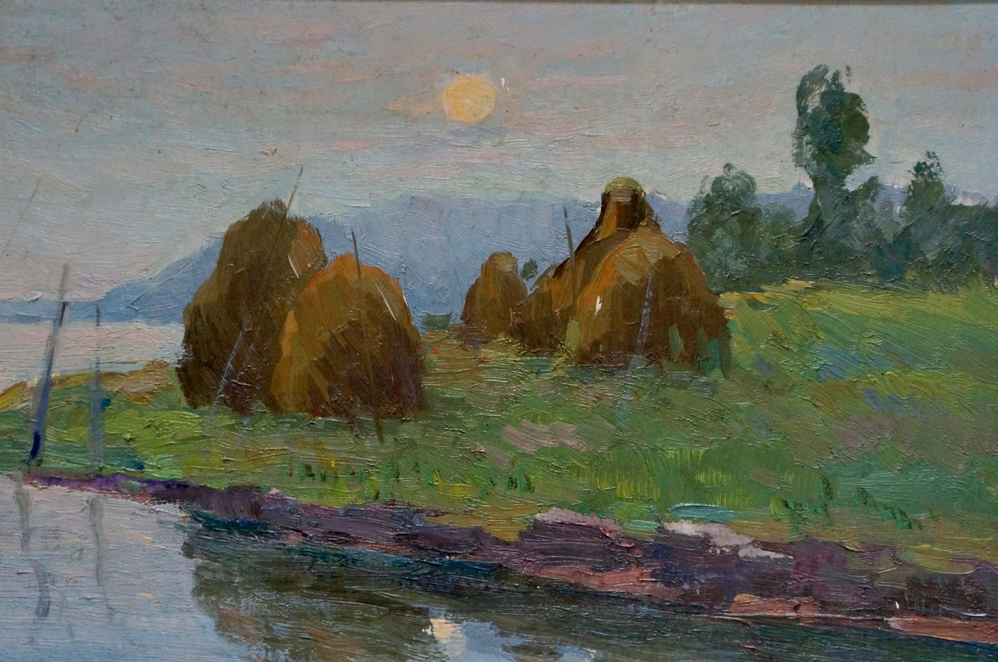 Serene oil painting by Stremsky Alexander Ivanovich: golden hay bales in green field under sun