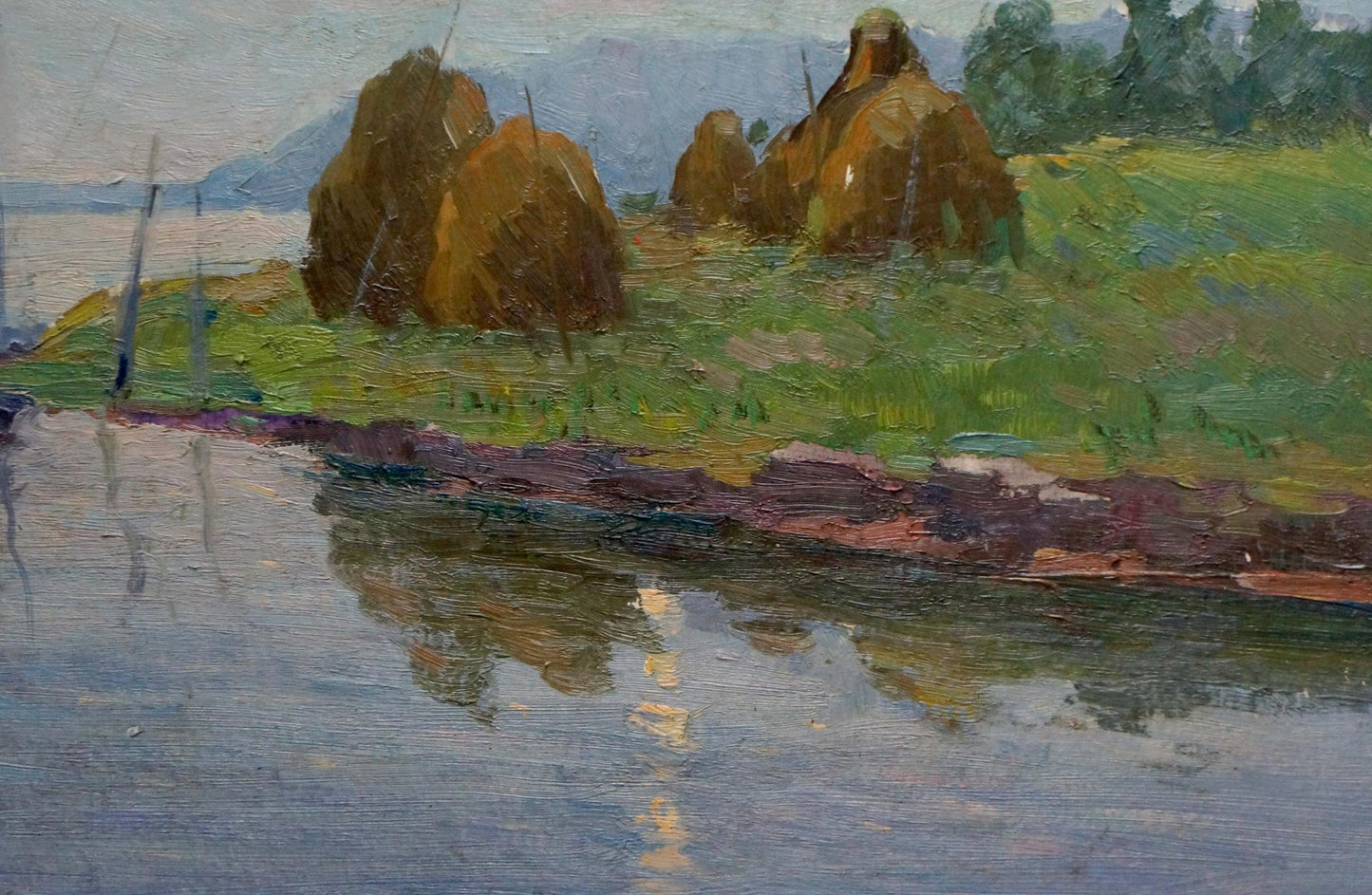 Oil painting by Stremsky Alexander Ivanovich: golden hay bales on green field by shore