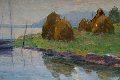 Oil painting by Stremsky Alexander Ivanovich: golden hay bales near shore