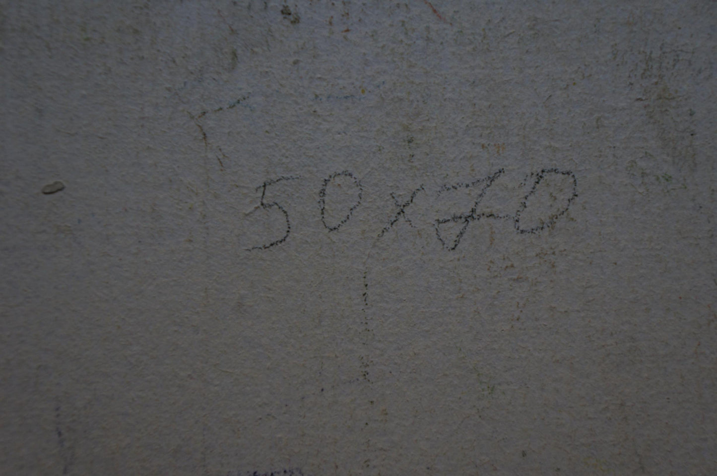 Back of Olkhov Vladimir Nikolaevich oil painting with 50x70 handwritten on gray concrete