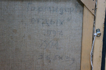 Back of framed oil painting Man is resting by Garmider Gennady Vasilievich with faded Cyrillic text on linen