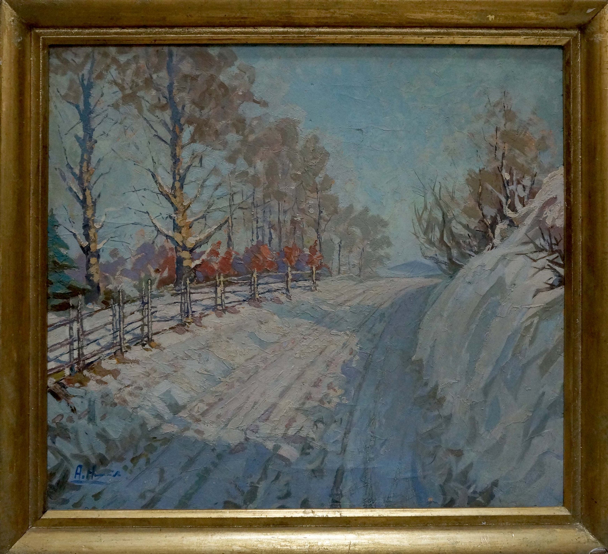 Framed oil painting of snowy rural road with bare trees by unknown artist