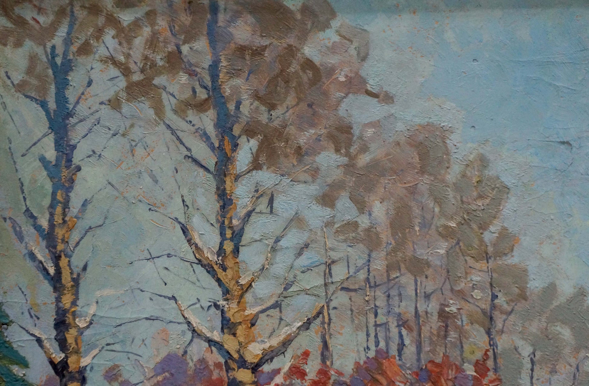 Impressionistic oil painting of bare winter trees along a road by unknown artist