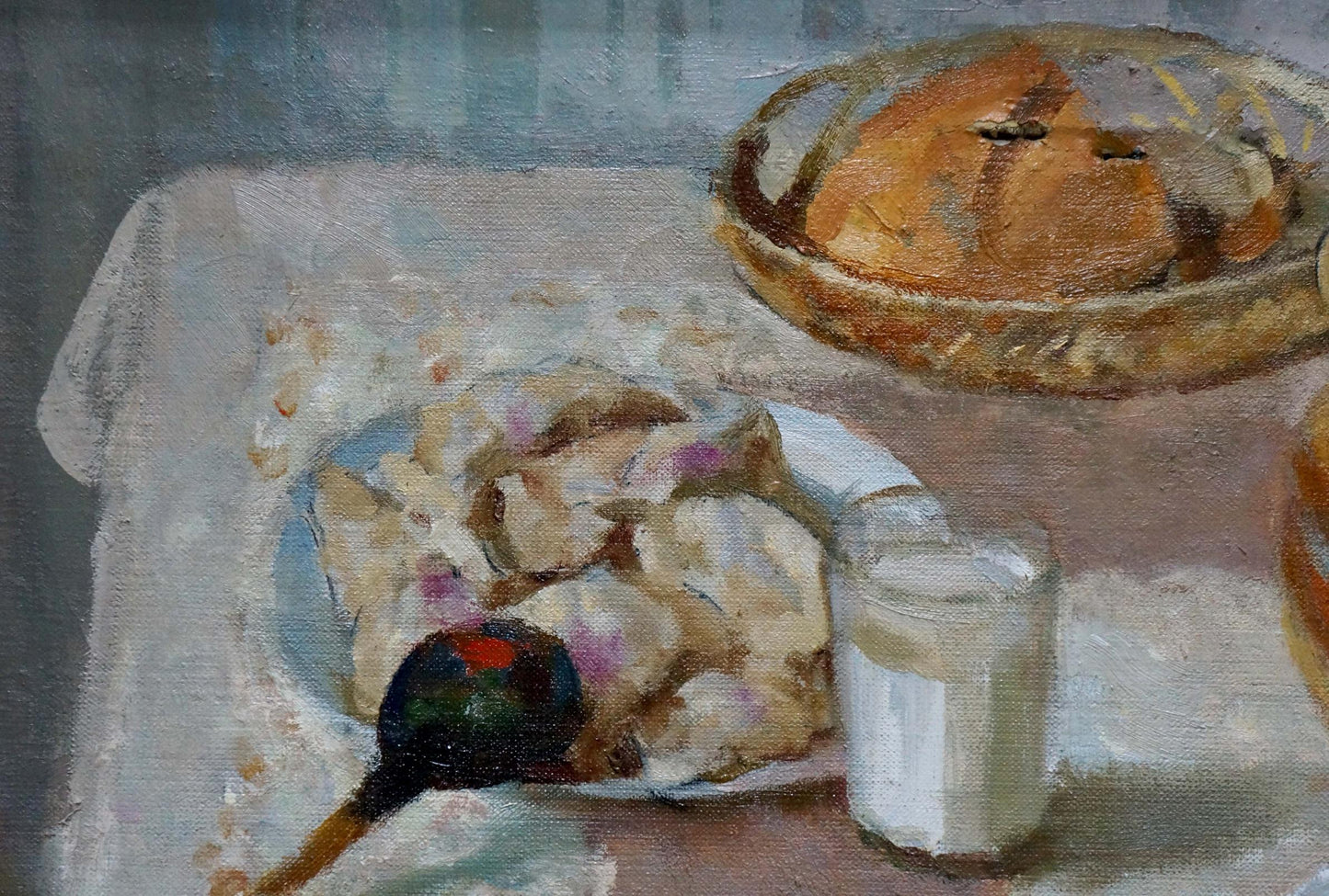 Oil painting of rustic golden-brown bread loaf in woven basket by Smirnov Valentin Sergeevich