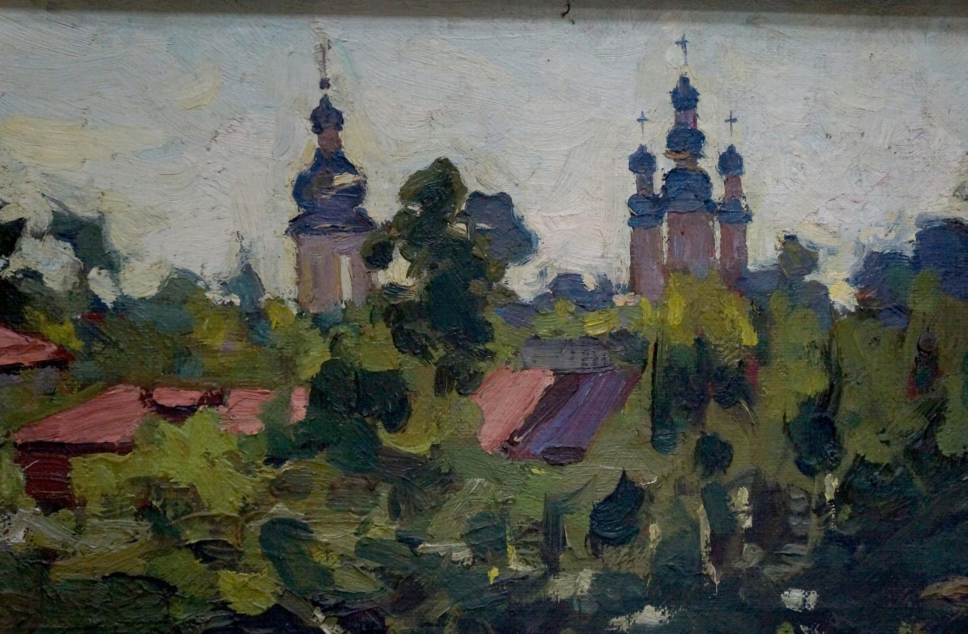 Oil painting by Basanets Petr Alekseevich: onion-domed churches above trees