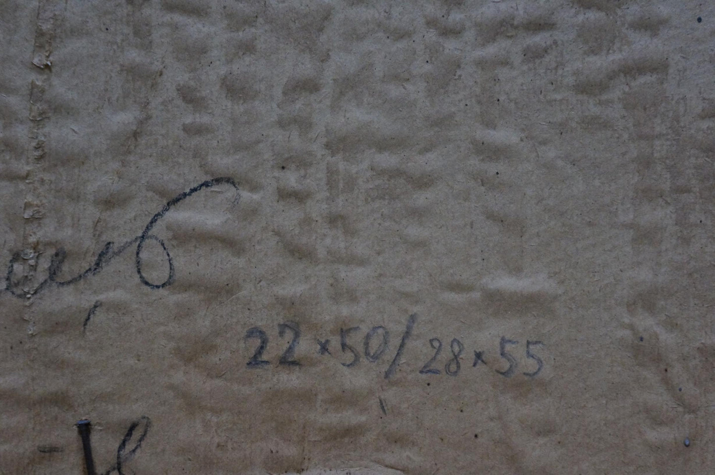 Back of oil painting by Basanets Petr Alekseevich: gray textured wall with handwritten markings