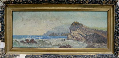Antique oil painting of rugged seascape cliffs and waves in ornate gilded frame