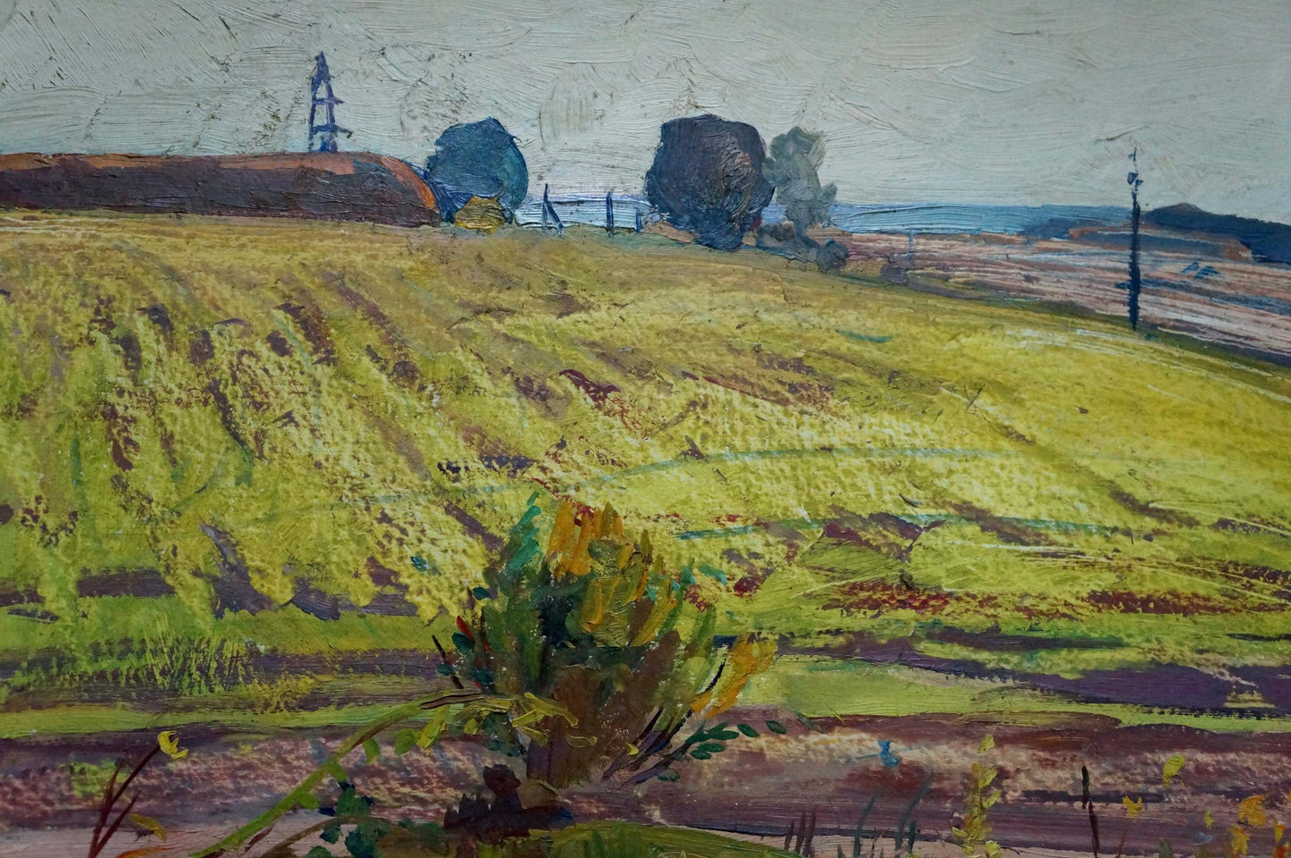 Textured impressionist oil painting of farmers field with green hills, trees, poles