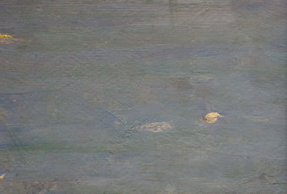 Textured grayish-blue painted back of oil painting Sunset over the sea with dry leaf