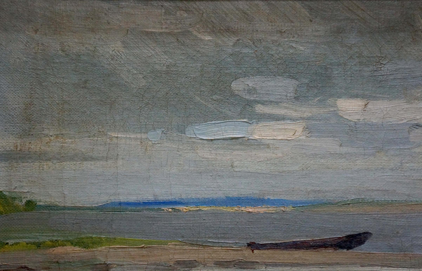 Oil painting of dark rowboat on sandy riverbank shore under overcast sky