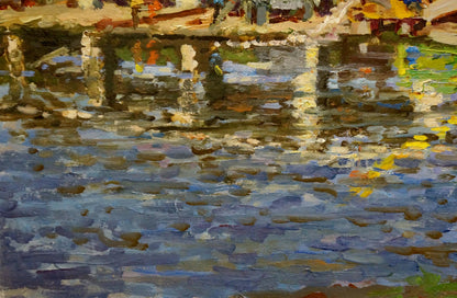 Vibrant impressionist oil painting by Korygin Konstantin Nikolaevich of river reflecting buildings