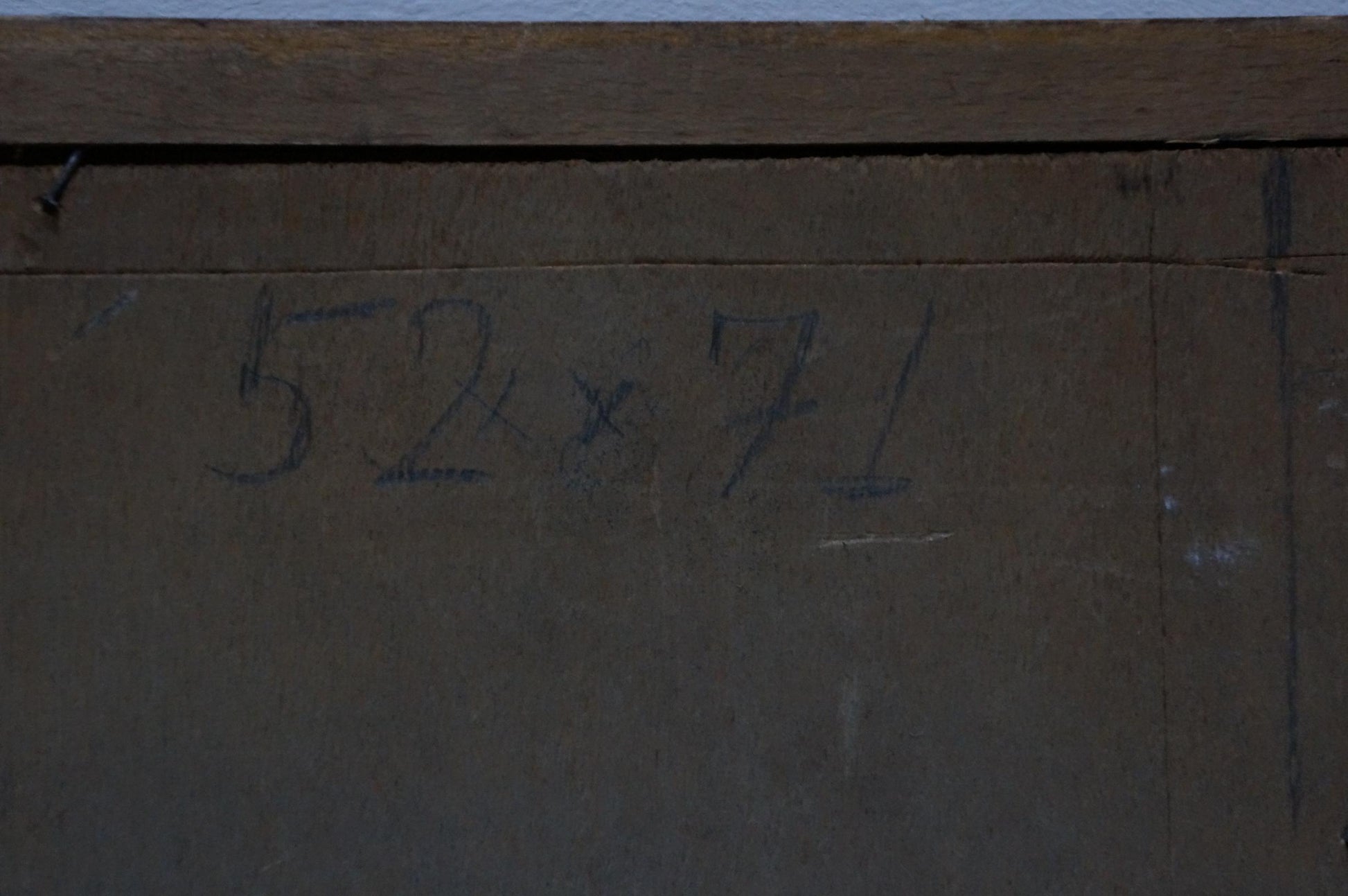 Back of Oil painting Lilac G. Shevchuk with 52 x 71 inch markings on dark wood