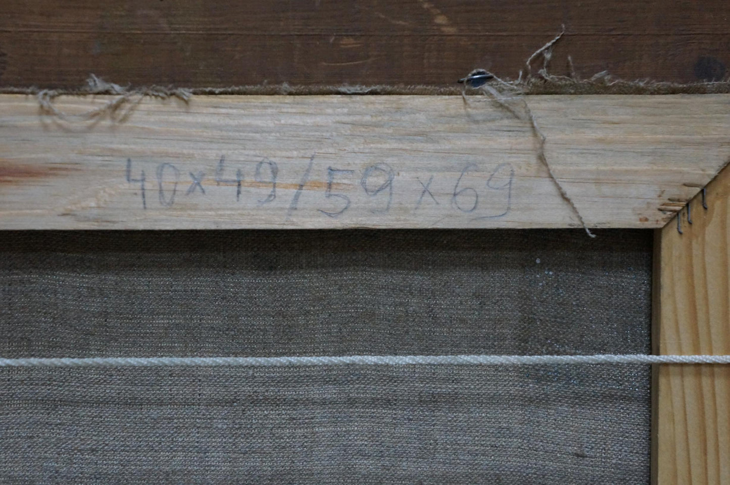 Back of oil painting Autumn Forestscape: weathered stretcher bar with pencil measurements