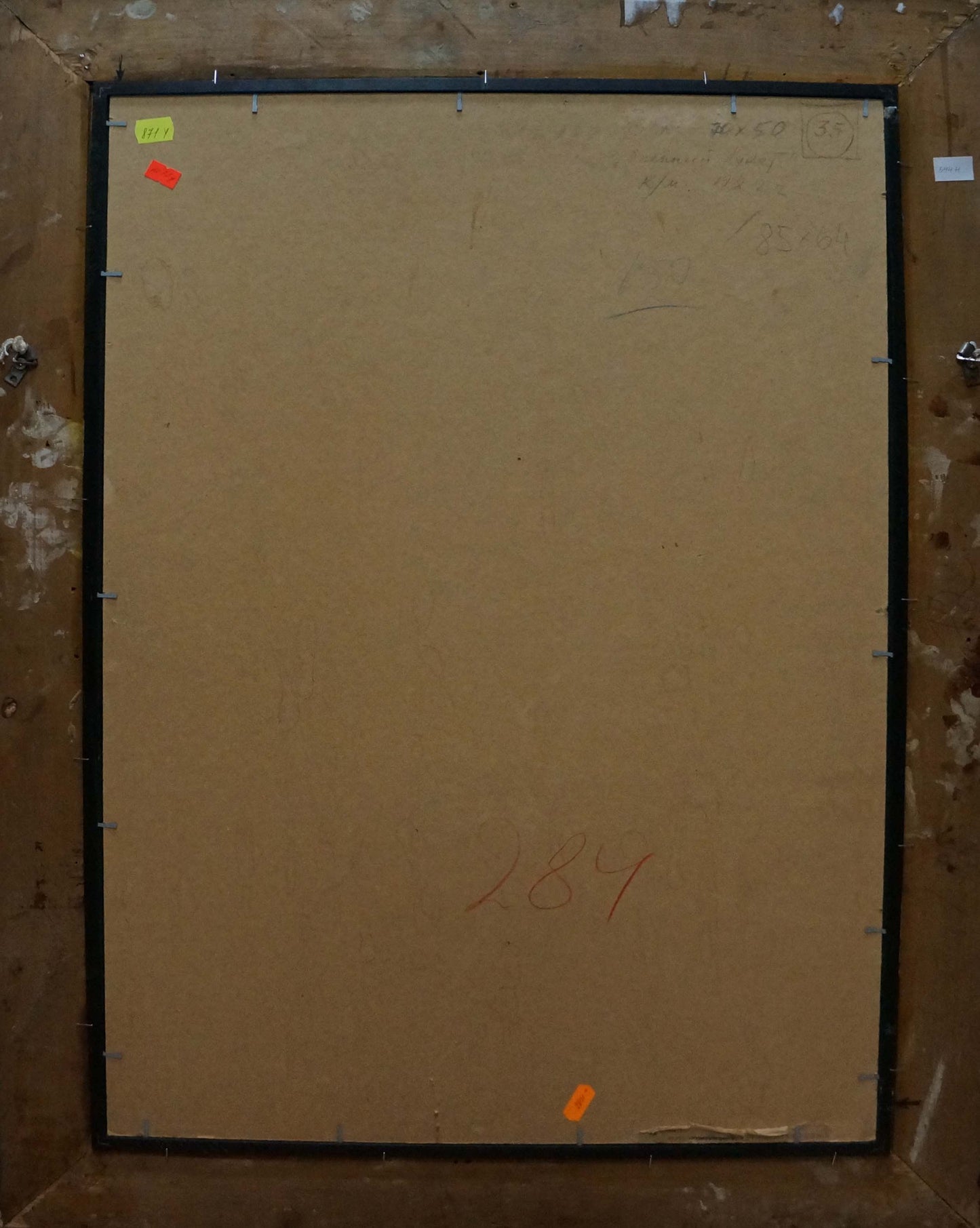 Back of Vasily Chegodar Flowers and Plums oil painting framed with beige backing and orange tags
