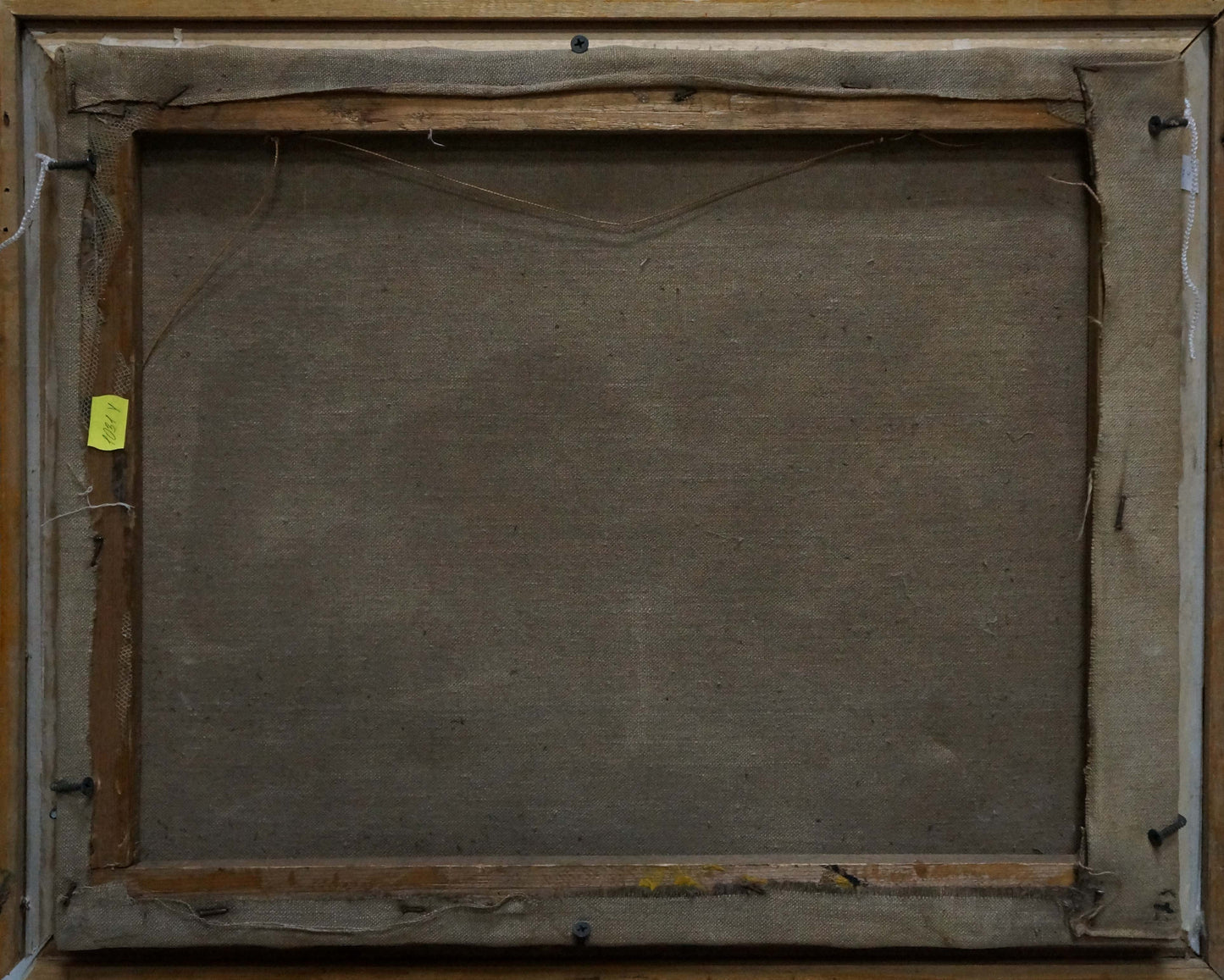 Back of framed Oil painting Undraped girl by Victor Sergeevich Bart with staples