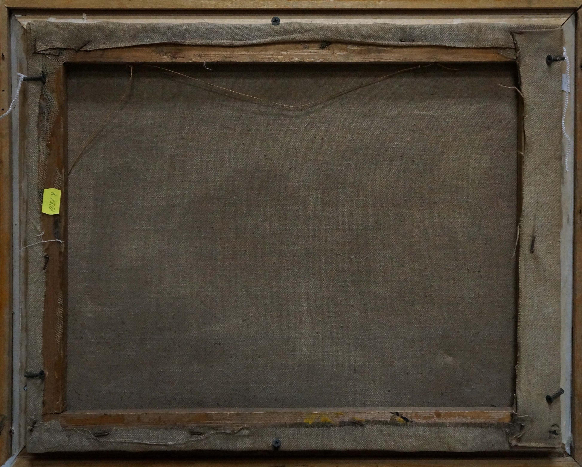 Back of framed Oil painting Undraped girl by Victor Sergeevich Bart with staples